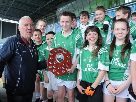 Jimmy Connor chairman, presenting Dylan Carney Capt of Derrinabroc N.S. with the Div 3 Plaque at the Cumann na mBunscol hurling finals in Mc Hale Park. Picture; Frank Dolan